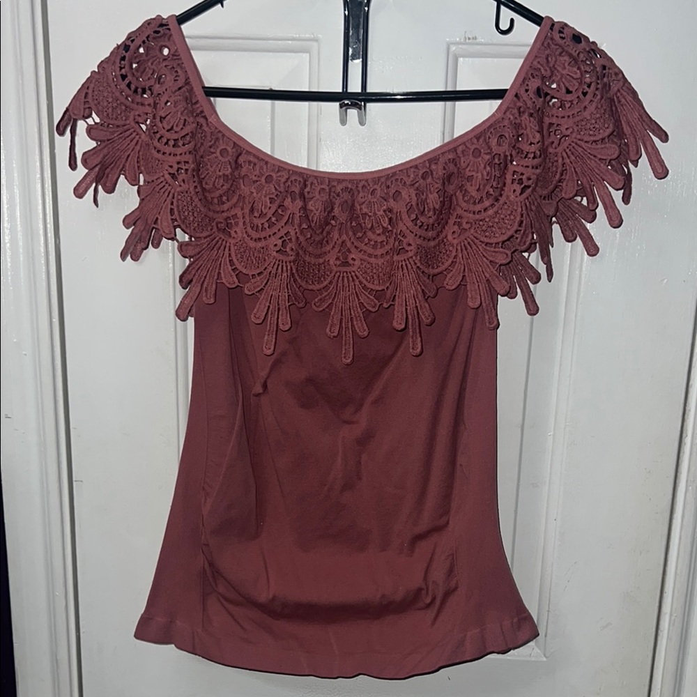 Red Sleeveless Ruffled Blouse with Embellished Details